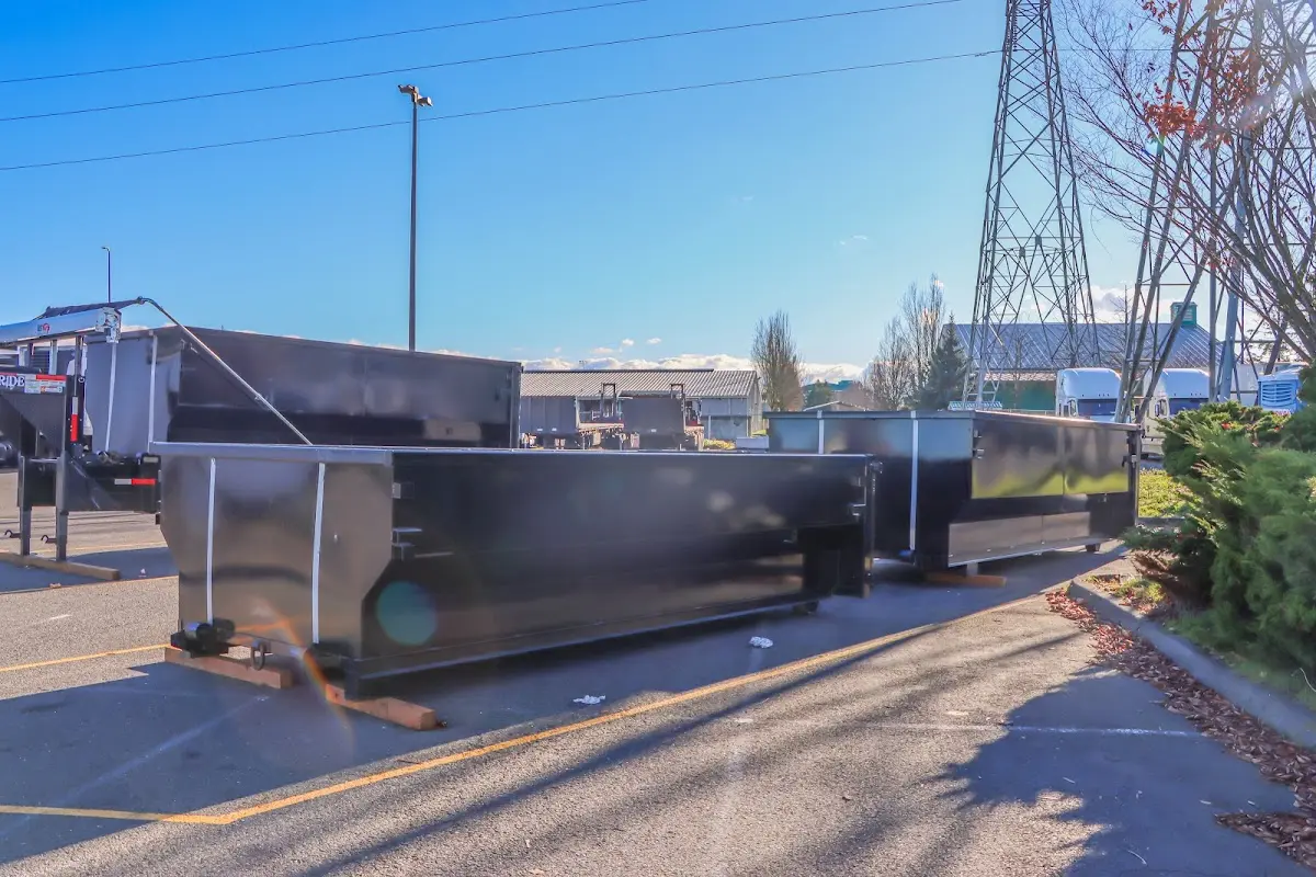 Roll-off dumpster ready for waste disposal at job site for 2 Yard Dumpster Rental in Dennis